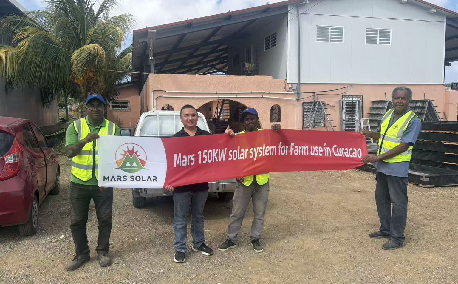 Mars Solar team commissioning a 150kW Caribbean solar system on a Curacao farm