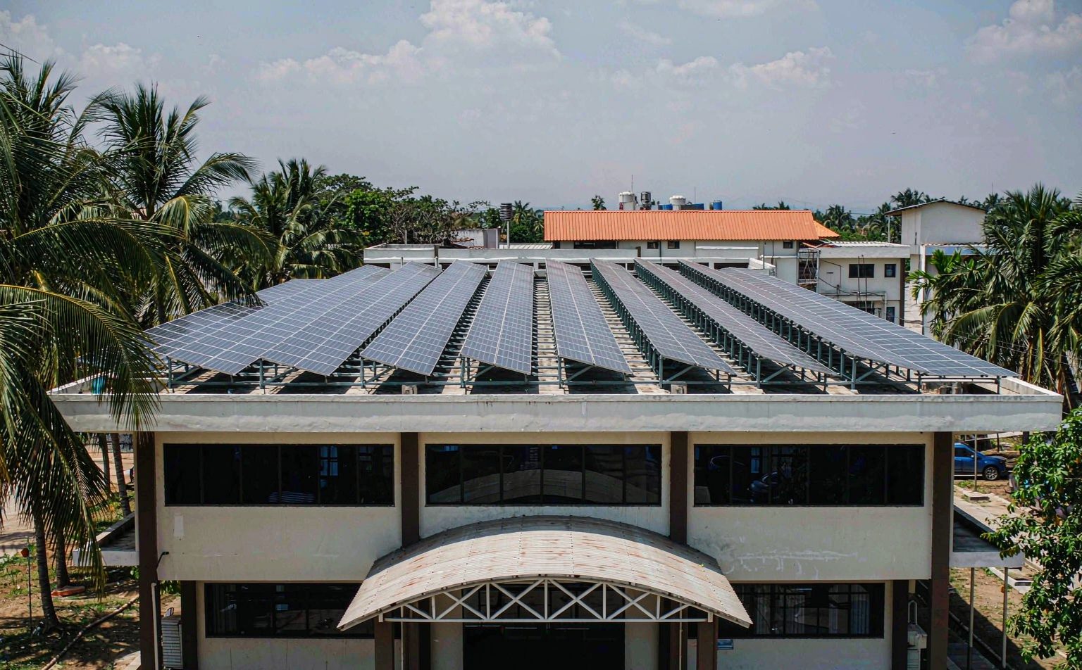 Solar for schools and hospitals: rooftop solar array on a two-storey hospital building