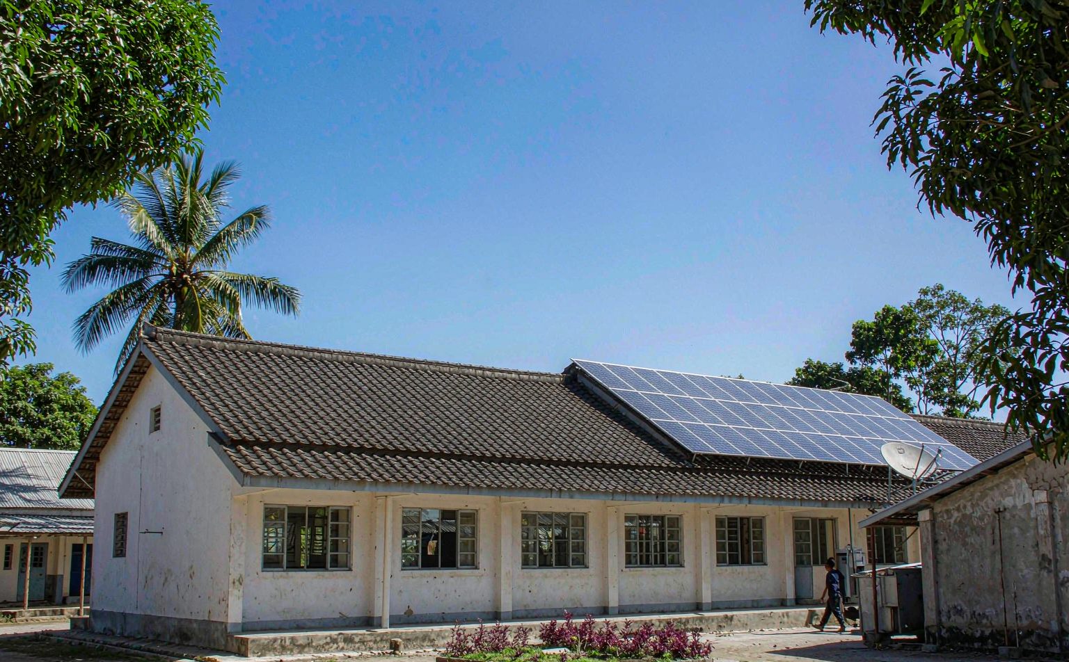 Solar for schools and hospitals: rooftop PV array on a low-rise school classroom block